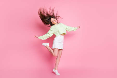 Full length profile photo of attractive youngster lady raise arms leg dancing students party hairdo...