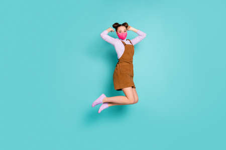 Full length photo of attractive joyful top knot hairdo lady avoid crowd stay home wear bright pink...