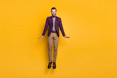 Full body photo of handsome stylish well-dressed business guy jump high up good mood flirty look...