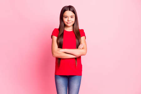 Photo of latin kid girl cross hands wear casual style outfit isolated over pink color backgroundの写真素材