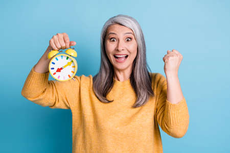 Yeah i in time deadline. Crazy delighted old woman hold clock raise fists scream wear style stylish...