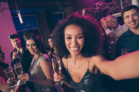 Photo portrait selfie of woman drinking champagne at glamourous party