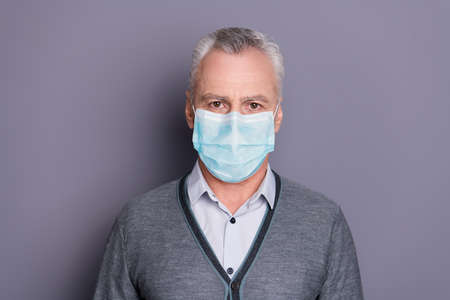 Portrait of his he nice-looking attractive serious financier lawyer attorney business shark wear mask isolated over gray pastel backgroundの写真素材