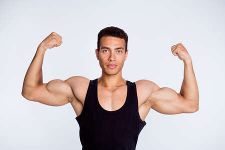 Close-up portrait of his he nice attractive sportive virile successful serious muscular guy...