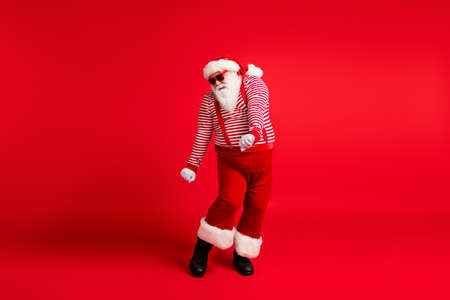 Full length body size view of his he nice handsome attractive thick cheery childish Santa dancing...