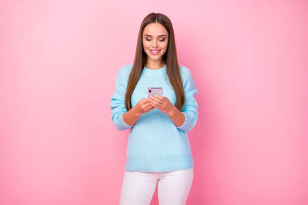 Photo of attractive lady hold telephone hands enjoy communication friends boyfriend wear knitted...