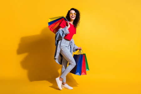 Profile photo of lady laugh hold store packages wear red t-shirt striped jeans jacket sunglass...