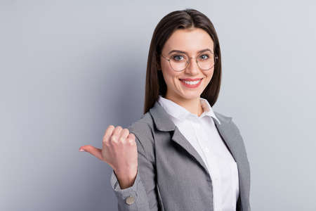 Photo of attractive business lady worker advising colleagues stay at home direct finger side empty...