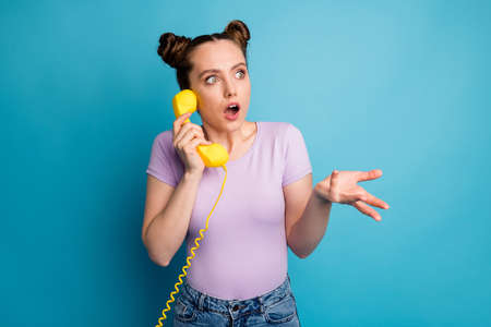 Really Photo of pretty lady two funny buns hold cable telephone handset speaking friends open mouth...