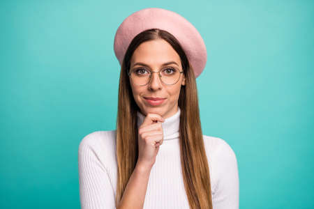 Close-up portrait of her she nice attractive lovely cute creative content cheerful straight-haired girl touching chin overthinking isolated over bright vivid shine vibrant blue color backgroundの写真素材