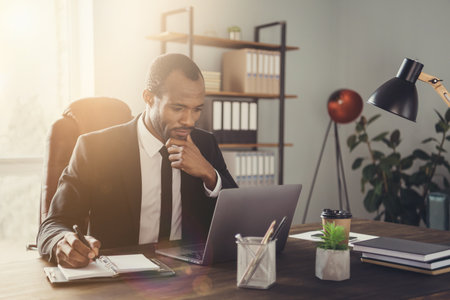 Portrait of his he nice attractive chic skilled smart clever focused guy marketer director writing plan strategy agenda appointment meeting week month at work place station indoorsの写真素材