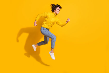 Full length body size side profile photo of jumping smiling happy girl running fast on sale isolated...