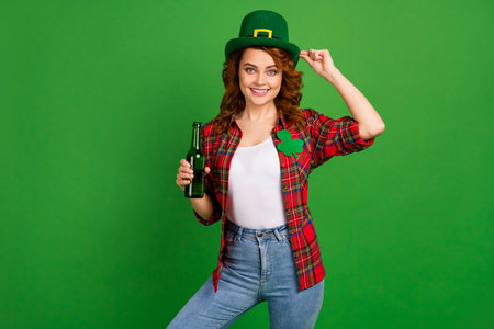 Portrait of her she nice attractive pretty charming cheerful cheery wavy-haired girl drinking beer...