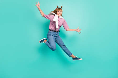 Full body photo of young excited girl happy positive smile jump up wave hello tight jumper isolated...