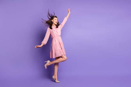 Full body profile portrait of pretty person closed eyes dance enjoy moment wear vintage isolated on magenta color backgroundの写真素材