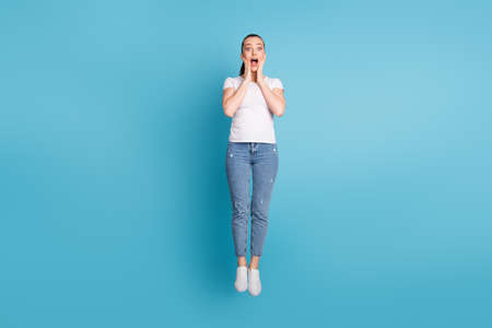Full length photo of astonished crazy girl hear incredible season bargain novelty enjoy rejoice...