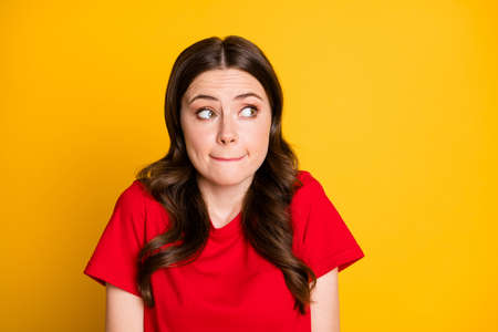 Portrait of frustrated girl look copyspace feel fear wear casual style outfit isolated over vivid color backgroundの写真素材