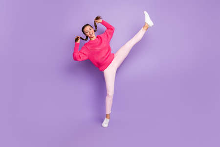Full size photo of young funky funny playful happy positive girl fooling around isolated on purple...