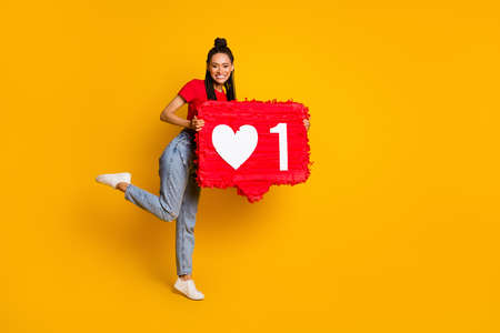 Full size photo of cheerful dark skin person hands hold paper like collage isolated on yellow color...