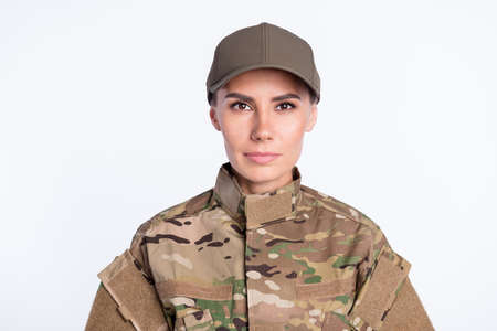 Photo of young woman serious confident wear soldier army wear uniform isolated over white color backgroundの写真素材