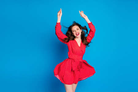 Full size portrait of charming person dancing have great time good mood wear vintage isolated on blue color backgroundの写真素材