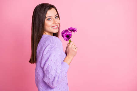 Profile side photo of young attractive girl happy positive smile hold flowers isolated over pink...