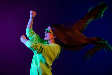 Profile side photo of funky happy young woman dance fly hair wear sunglass isolated on colorful...