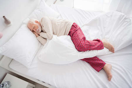 Top above high angle view of aged man lying in bed sleeping in silence rest relax comfort wear...