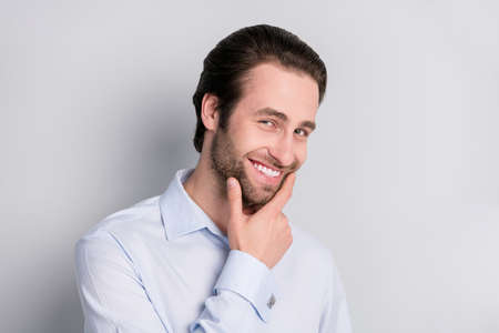 Photo portrait thoughtful smiling touching chin businessman wearing formalwear isolated grey color...