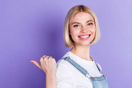 Profile photo of nice optimistic short hairdo blond lady point empty space wear white t-shirt...
