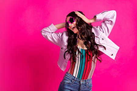 Profile photo of impressed brunette nice lady dance wear spectacles top jacket isolated on pink color backgroundの写真素材