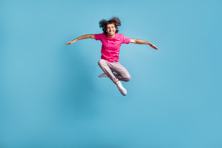 Full length body size view of nice cheerful sporty graceful guy jumping dancing contemporary...