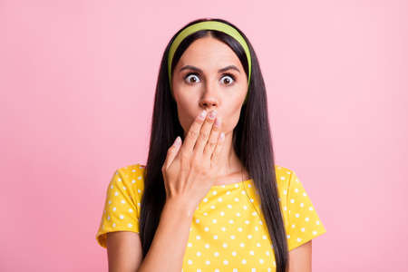 Photo of attractive person arm covering mouth unexpected news retro clothing isolated on pink color backgroundの写真素材