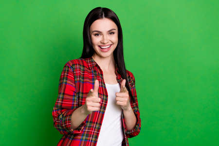 Photo of brunette hooray young lady point camera wear red shirt isolated on green color background