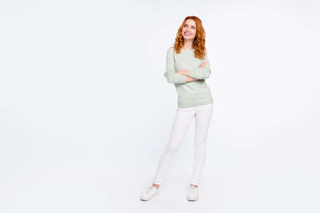Full length body size photo young business woman red hair folded hands looking copyspace isolated...