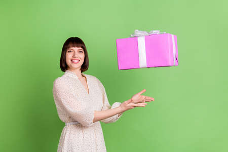 Profile side photo of young girl happy positive smile fly air fall catch present box birthday...