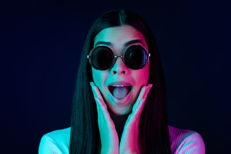 Photo of hooray young millennial lady hands face wear eyewear white sweater isolated on black dark...
