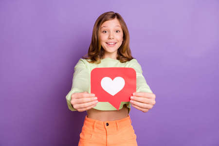 Photo of young little girl happy positive smile show like reaction icon blogger popular isolated...