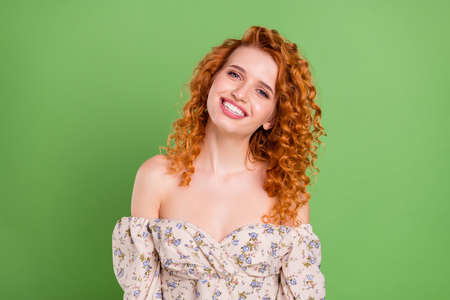 Photo of cheerful charming pretty lady good mood smile enjoy weekend isolated on shine green color...