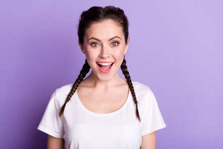 Portrait of amazed happy cheerful young woman shock sale news good mood