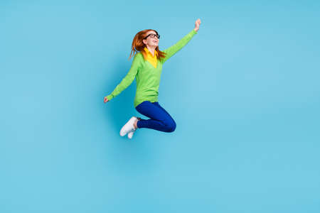 Full length profile photo of young funny millennial lady jump wear spectacles sweater trousers...
