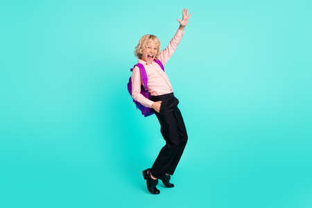 Full length body size view of attractive cheerful crazy boy dancing having fun isolated over bright...