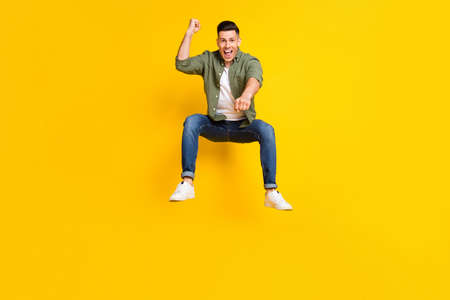 Full length body size photo guy jumping up imagine rodeo isolated vibrant yellow color background