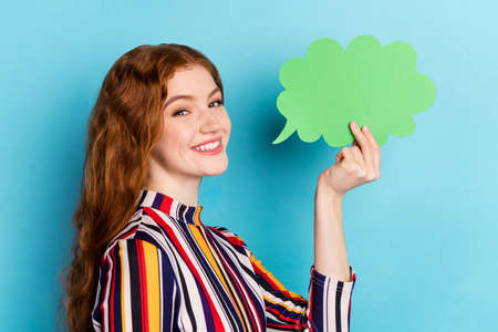 Profile photo of sweet red hairdo millennial lady hold bubble wear colorful shirt isolated on blue...