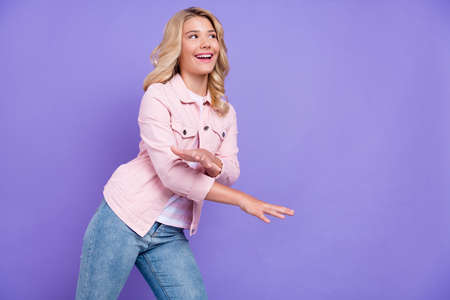 Photo of adorable pretty schoolgirl wear pink outfit dancing looking empty space smiling isolated...