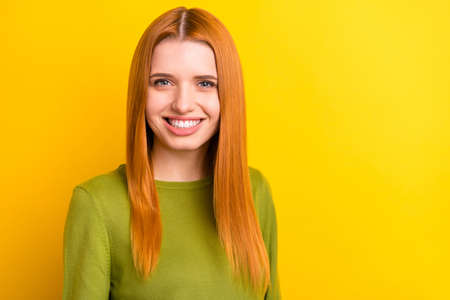 Photo of lovely red hair young lady wear green pullover isolated on yellow color background