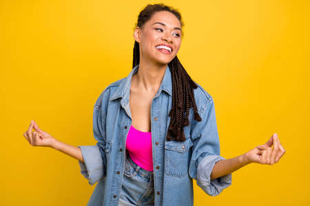 Photo of young cheerful black girl happy positive smile clink fingers disco isolated over yellow...