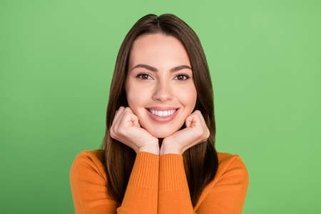 Photo portrait woman smiling happy wearing casual clothes isolated pastel green color backgroundの写真素材