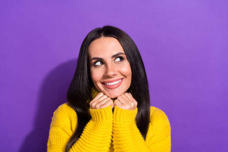 Portrait of gorgeous satisfied lady hands under chin beaming smile look empty space isolated on...