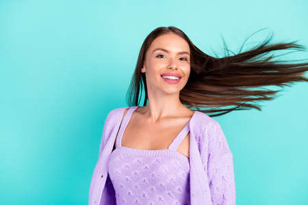 Photo of shiny adorable young woman dressed purple clothes smiling isolated teal color background